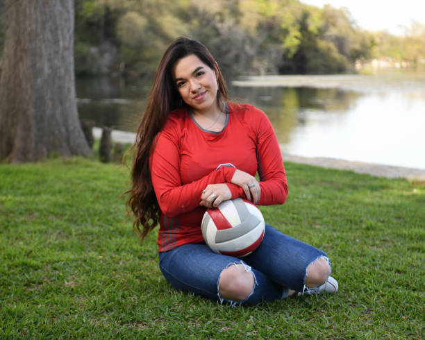istock High School Senior Megan Posing for Graduation Photos 1135517817