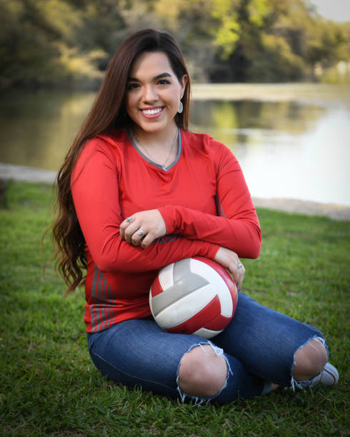 istock High School Senior Megan Posing for Graduation Photos 1135518201
