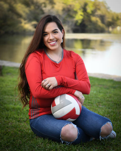 istock High School Senior Megan Posing for Graduation Photos 1135519791