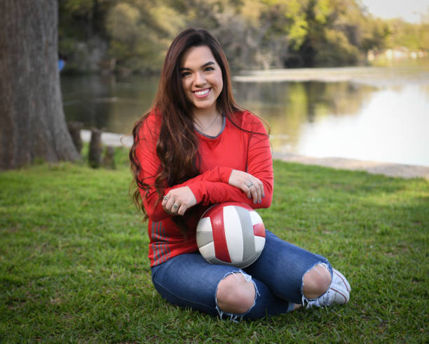 istock High School Senior Megan Posing for Graduation Photos 1135519920