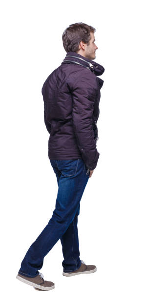 istock Side view of going handsome man in jeans and jacket. 1135520182