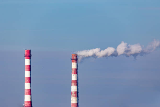 istock Smoke emission from factory pipes 1135520318