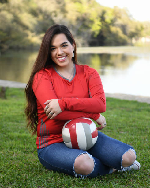 istock High School Senior Megan Posing for Graduation Photos 1135520394