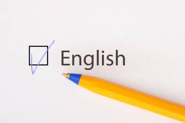 istock English - checkbox with a tick on white paper with yellow pen. Checklist concept. 1135521430