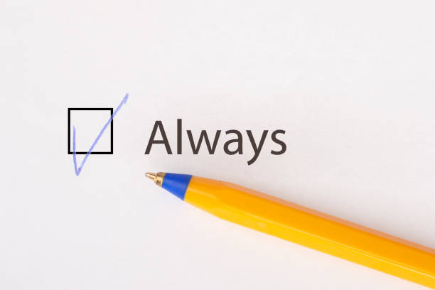 istock Always - checkbox with a tick on white paper with yellow pen. Checklist concept. 1135521790