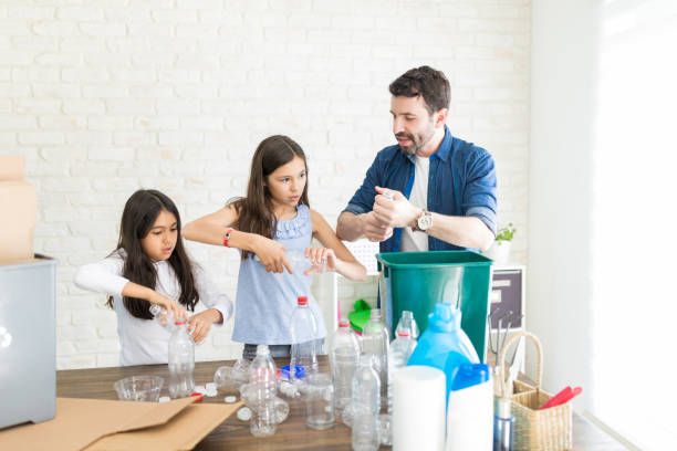 istock Family Crushing Bottles Together 1135521804