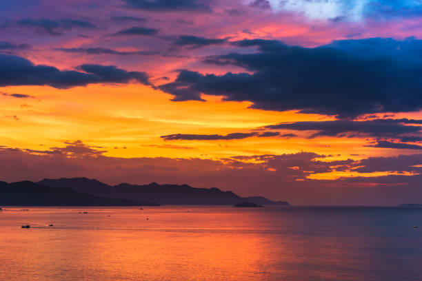 istock Sunset seascape with dramatic sky and colorful clouds 1135521853