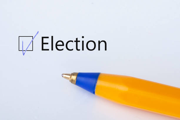 istock Election - checkbox with a tick on white paper with yellow pen. Checklist concept. 1135521882