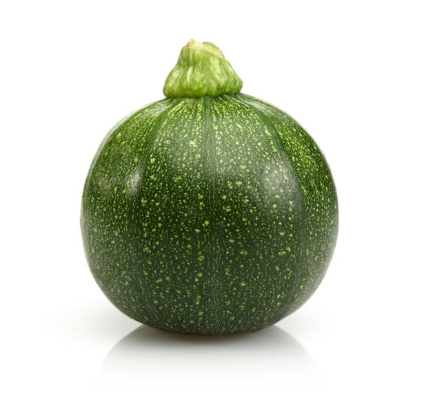 istock Green round zucchini isolated on white 1135522119