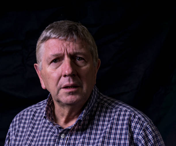 istock anxious senior man portrait 1135523278