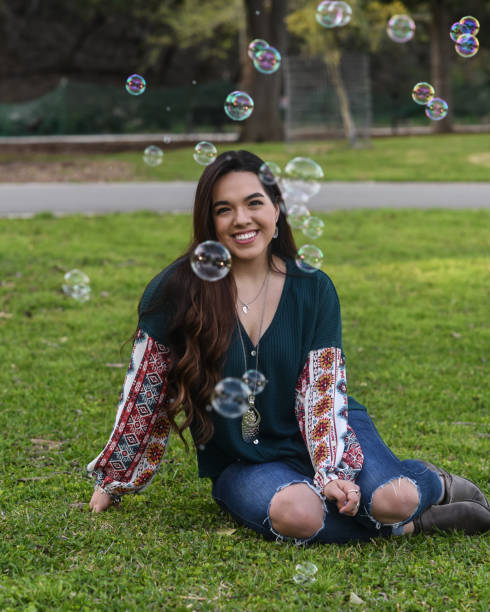 istock Beautiful High School Senior posing for graduation photos 1135524915