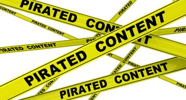 istock Pirated content. Labeled yellow warning tapes 1135530872
