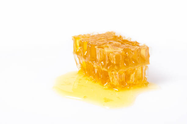 istock A piece of honeycomb on white background 1135531415
