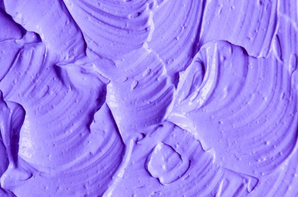 istock Lavender face cream/mask/body wrap texture close up. Brush strokes. Selective focus. Abstract violet background 1135532211