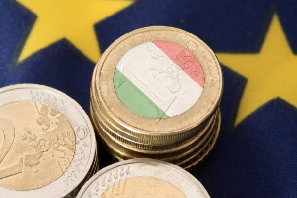 Flag of Italy and European Union EU and Euro coins stock photo