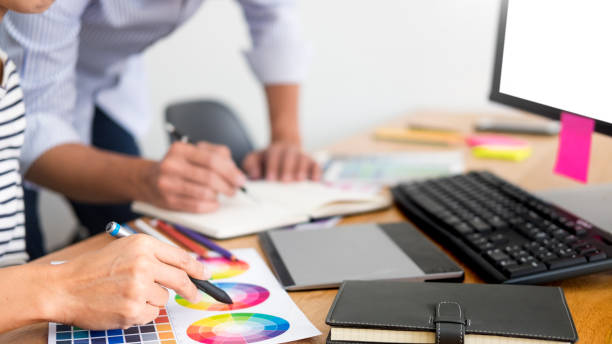 istock Midsection Of Business Coworkers Working In Office 1135534176