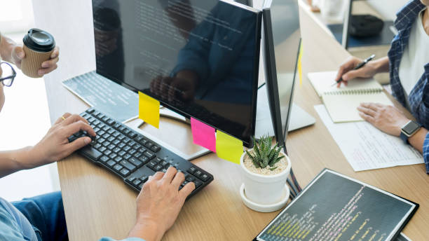 istock High Angle View Of People Working In Office 1135536254
