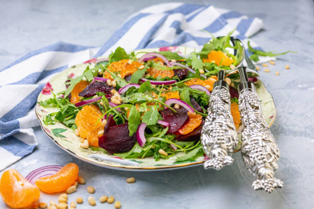 istock Salad of baked beetroot, arugula and pine nuts. 1135538407
