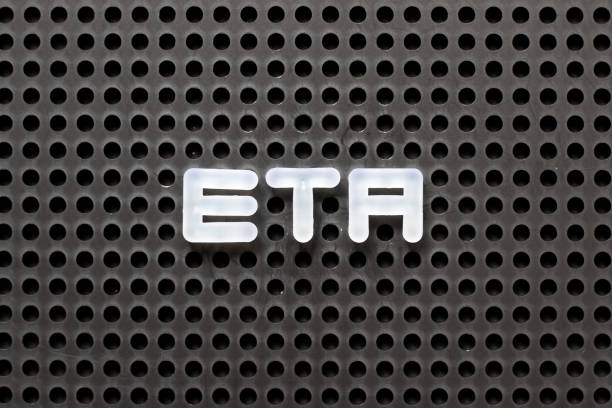 istock Black color pegboard with white letter in word ETA (Estimated time of arrival) 1135539628