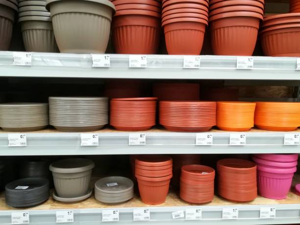 istock Plastic flower pots for sale in the store 1135539864