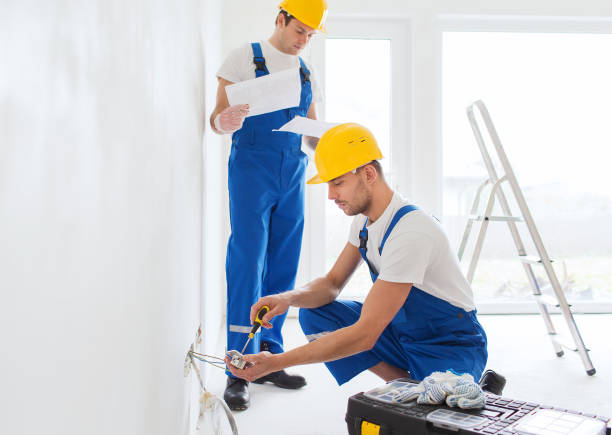 istock builders with tablet pc and equipment indoors 1135540188