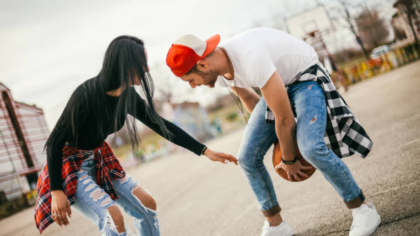 istock Couple having fun on basketball 1135541185