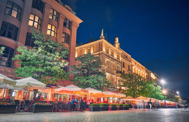 Cafes and restaurants at night in Krakow, Poland