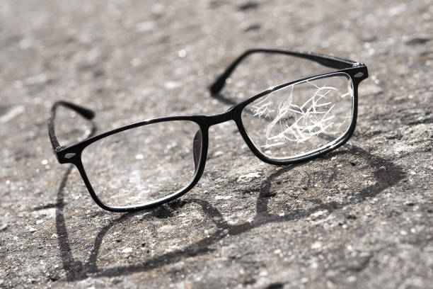 istock broken glasses lying on the street asphalt 1135543044
