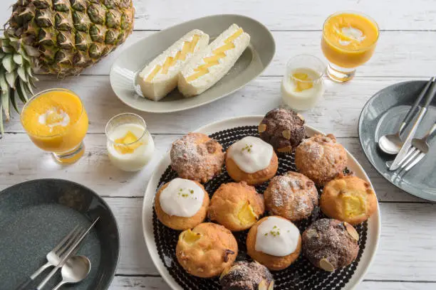 Photo of fruits sandwich, muffin and smoothie with fresh fruits