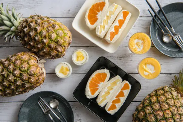 Photo of fruits sandwich, muffin and smoothie with fresh fruits