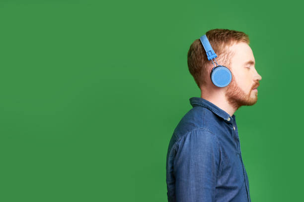 istock Man listening to music 1135543134
