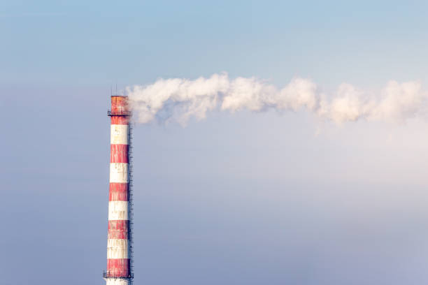 istock Smoke emission from factory pipes 1135544176