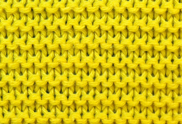 istock Yellow background of knitted 1135547724