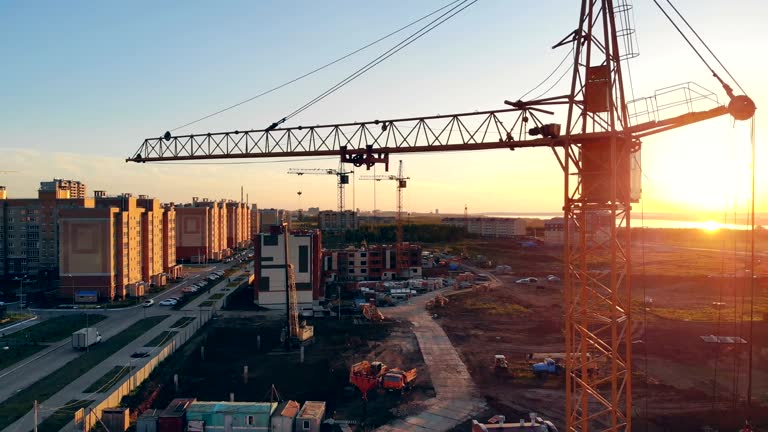 construction crane at a construction site. 4K.