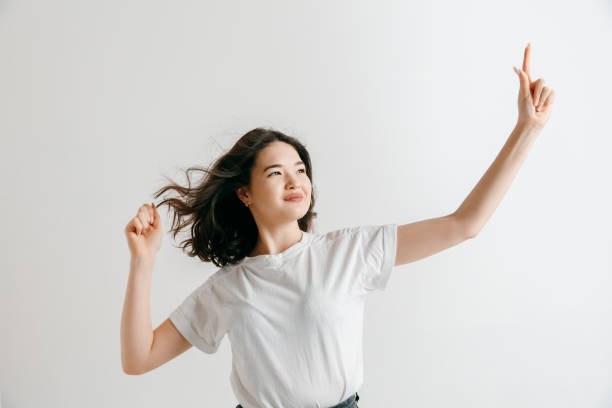 istock Winning success woman happy ecstatic celebrating being a winner. 1135549305
