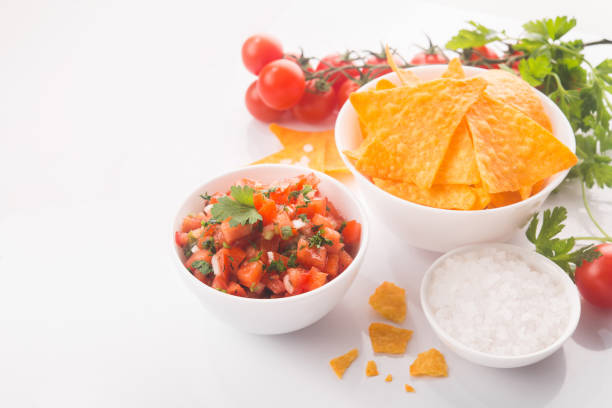 istock Mexican tomato salsa with tortilla chips 1135550600