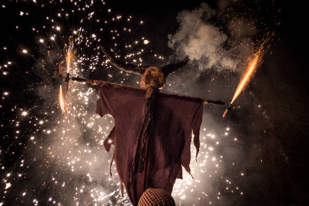 A two-horns demon. During the Correfoc traditional celebrations, firework-toting demons rush wildly down the streets scattering sparks in a fiery re-enactment of the eternal battle between good and evil.