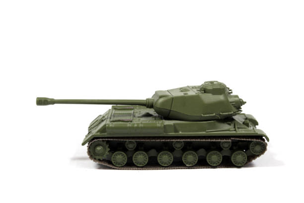 istock Vintage Used Child's Toy Tank On White Background 1135551279