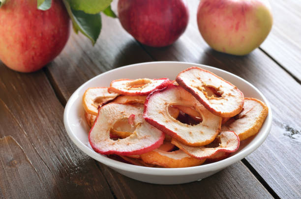 istock Dried apple rings in white bowl 1135551393