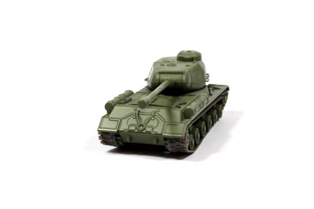 istock Vintage Used Child's Toy Tank On White Background 1135551990