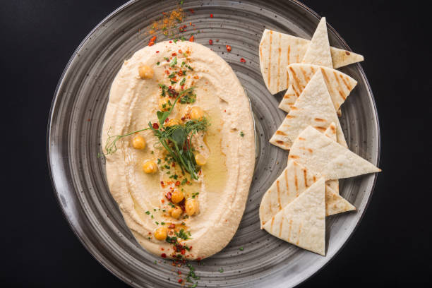 istock vegetarian food hummus with chickpea in a restaurant 1135555699