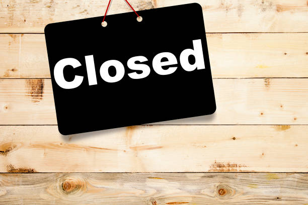 istock Closed on wooden background 1135558665