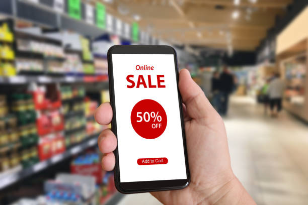 istock Shopping sale e-commerce marketing mobile phone app coupon 1135558833