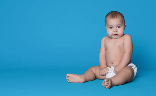 istock Surprised cute baby boy looking at camera 1135558889
