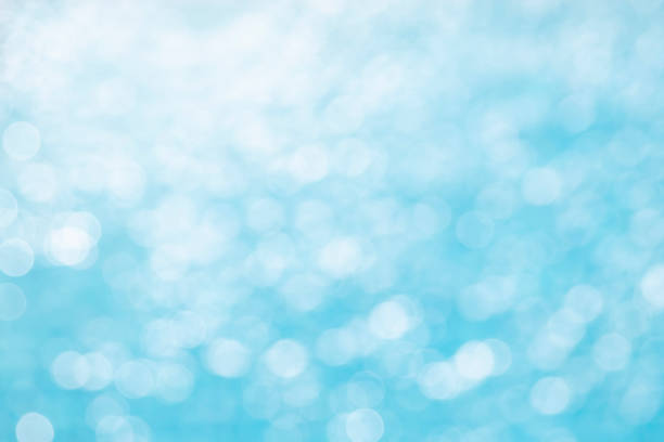 istock Abstract of bokeh lights on blue 1135561348
