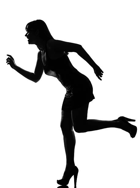 istock stylish silhouette woman running happy 113556219