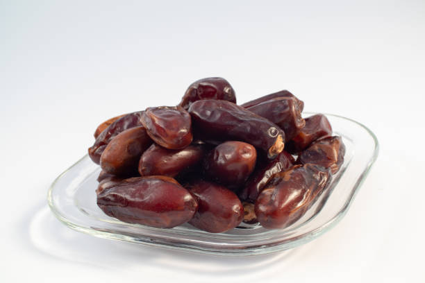 istock Kurma Dates In Small Glass Plate 1135562264