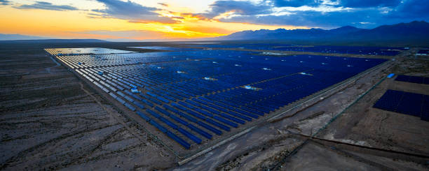 istock Aerial solar photovoltaic panel at sunset 1135563717