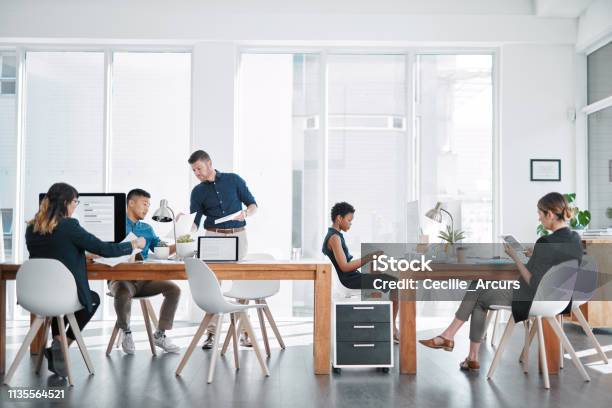 Handling Business Like The Go Getters They Are Stock Photo - Download Image Now - Office, Modern, Busy