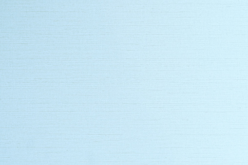 Blended cotton silk fabric textile wallpaper detailed texture pattern background in sweet light pale purple blue
